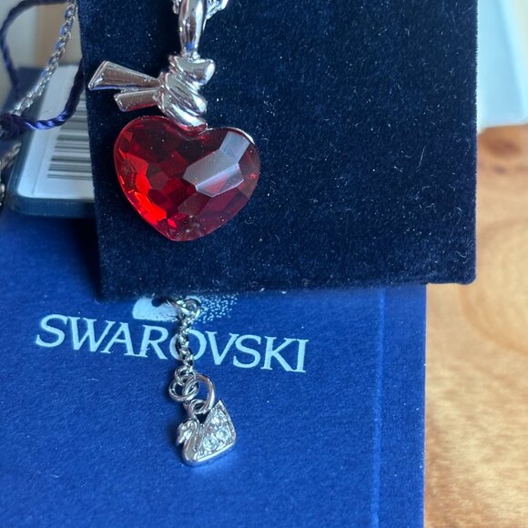 Swarovski Ties of Love pendant necklace with a red heart-shaped crystal. - Picture 3 of 11